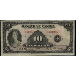 BC-8  1935 $10 French text F131095. About VF,