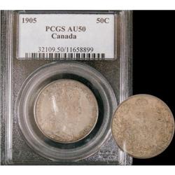 1905 50¢ PCGS AU50. Nicely toned.  Another gr