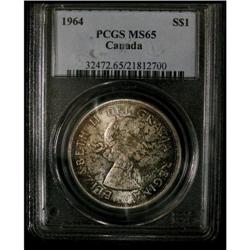 1964 $1 PCGS MS-65. Nicely toned. The coin is