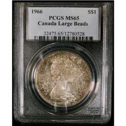 1966 Large beads $1 PCGS MS-65. Nicely toned.