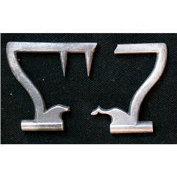 Silver belt and/or strap buckle. One half of