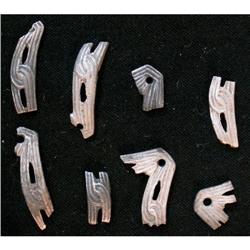 Fine Silver Band/buckle in 8 pieces.  Detaile