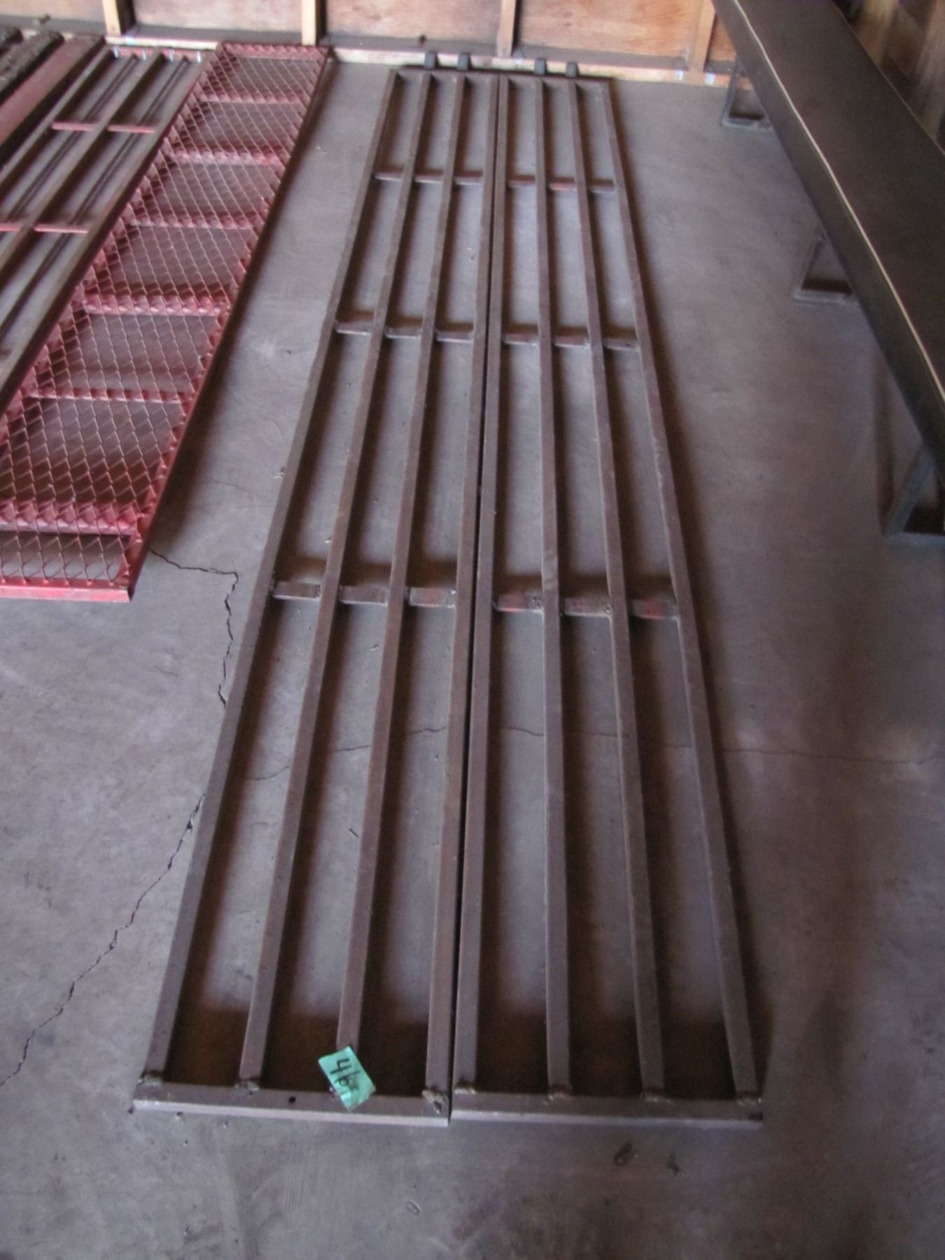 set of metal ramps 118 in