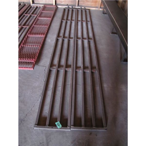 set of metal ramps 118 in