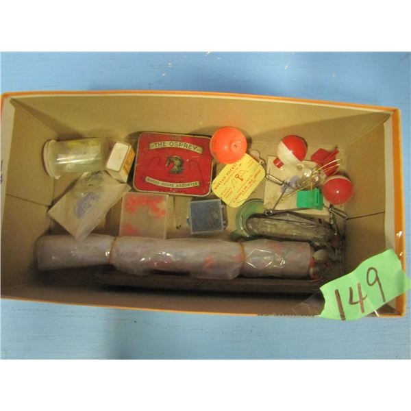 shoebox with various fishing tackle