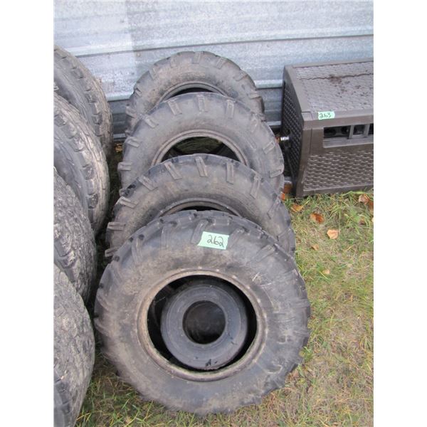 set of 4 quad tires - 2 - AT25 x 11 R 12 and 2 - AT25 x 8 R12  and one small Tire