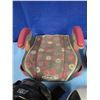 Image 5 : child's booster seat and various helmets