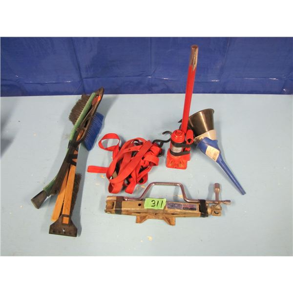 snow brushes, bottle jack, tie downs, etcetera