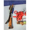 Image 2 : snow brushes, bottle jack, tie downs, etcetera