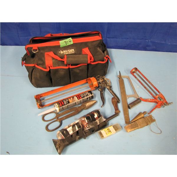 Husky tool bag with caulking guns Hilti gun Etc