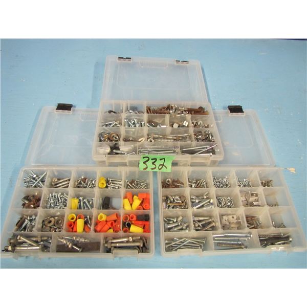 three organizers with nuts, bolts, screws, Etc