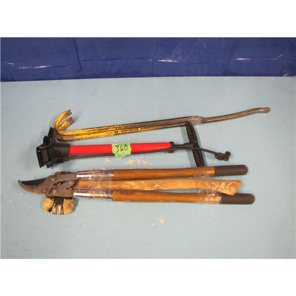 bicycle pump, crowbars, tree limber, axe