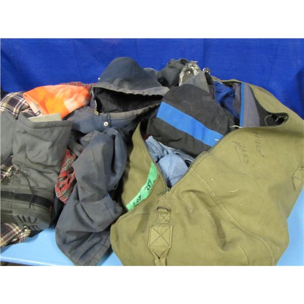assorted grocery totes, Ski-Doo suit, snow boots, miscellaneous clothing