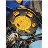 Image 4 : two garbage cans with extension cords, booster cables Etc