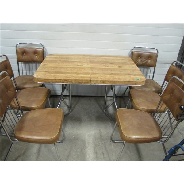 kitchen table with six Chrome frame chairs