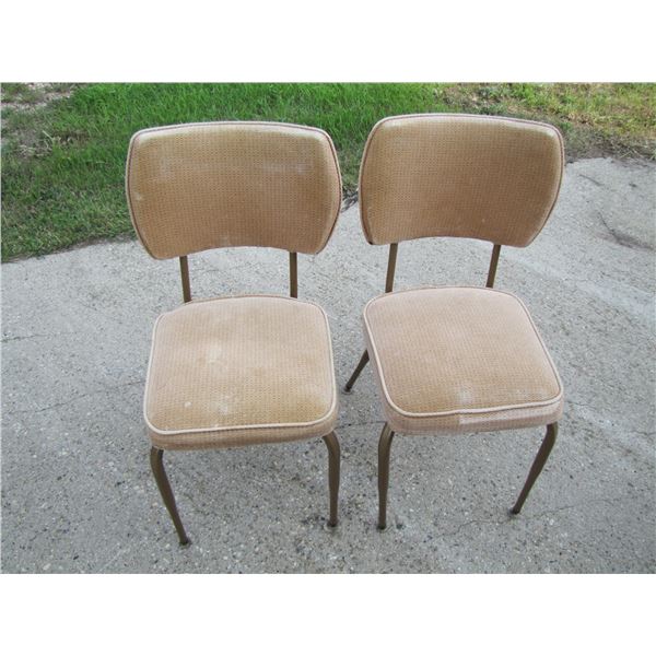two metal frame chairs