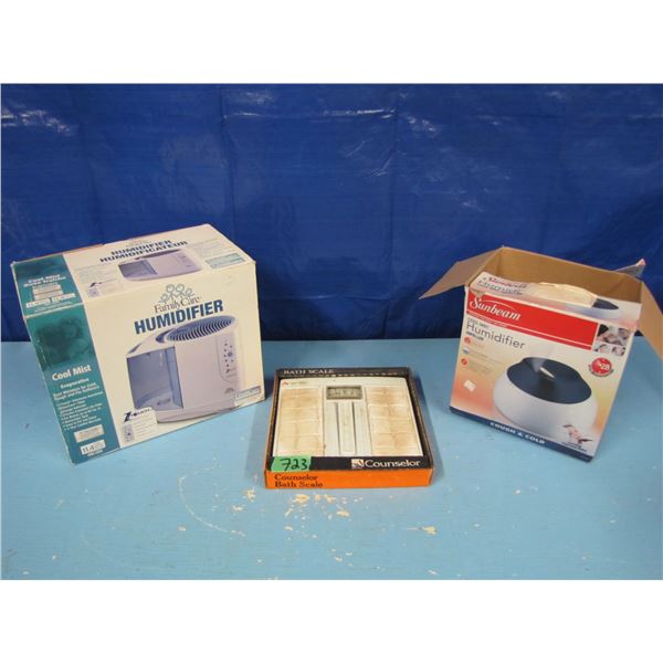 two humidifiers and bathroom scale