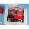 Image 11 : box with buttons, toy horse, toy tractors etcetera