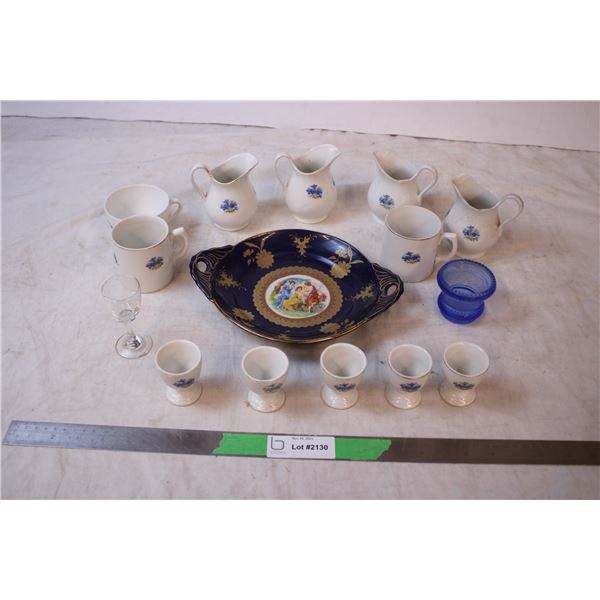 White and blue chinaware items