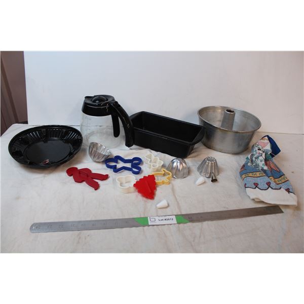 cookie cutters, bake pans, coffee pot, tea towel