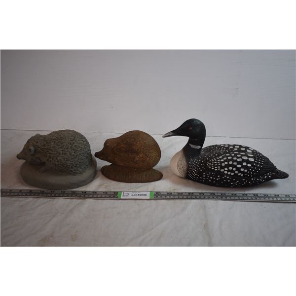 Cast Iron Hedgehog, Cement Hedgehog, and Ceramic Loon