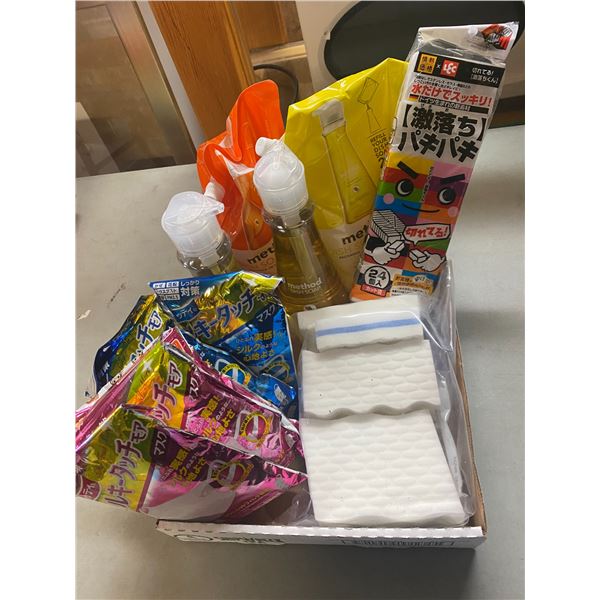 Assorted cleaners and sponges