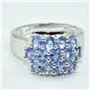 Image 1 : Silver Tanzanite (12.25ct) Rhodium Plated Ring (~weight 4.98g)