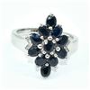Image 1 : Silver Blue Sapphire(12.25ct) Rhodium Plated Ring (~weight 3.26g)