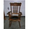 Image 1 : Antique Press back leather seat rocking chair - Take this vintage piece of nostalgia home.