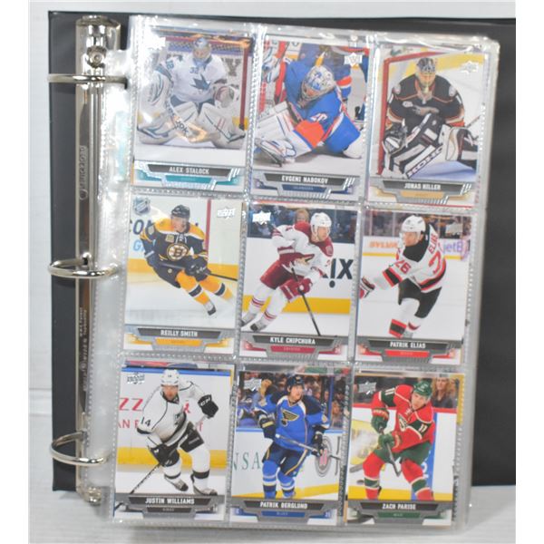 BINDER OF ASSORTED HOCKEY CARDS