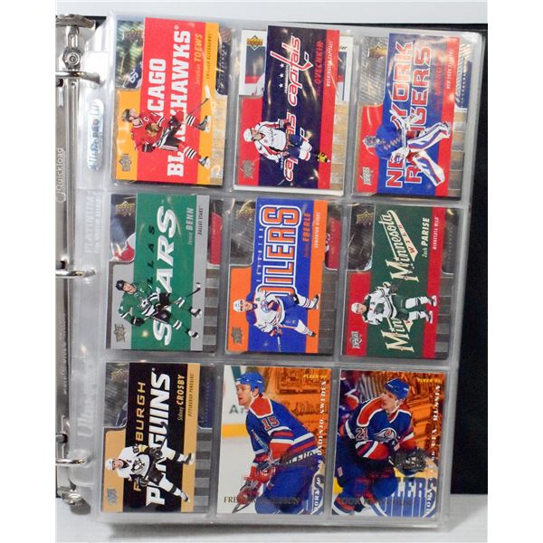BINDER OF ASSORTED HOCKEY CARDS