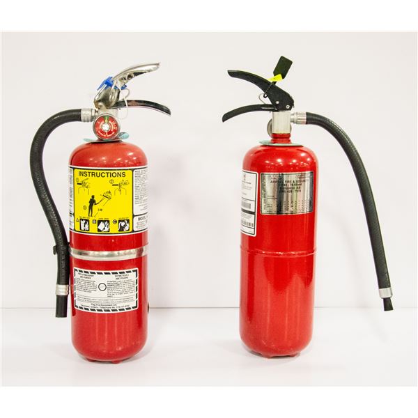 2 CHARGED FIRE EXTINGUISHERS BETWEEN 57LBS