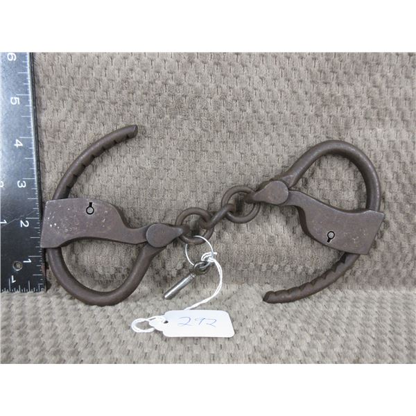 Vintage Hand Cuffs comes with key but it does not open lock