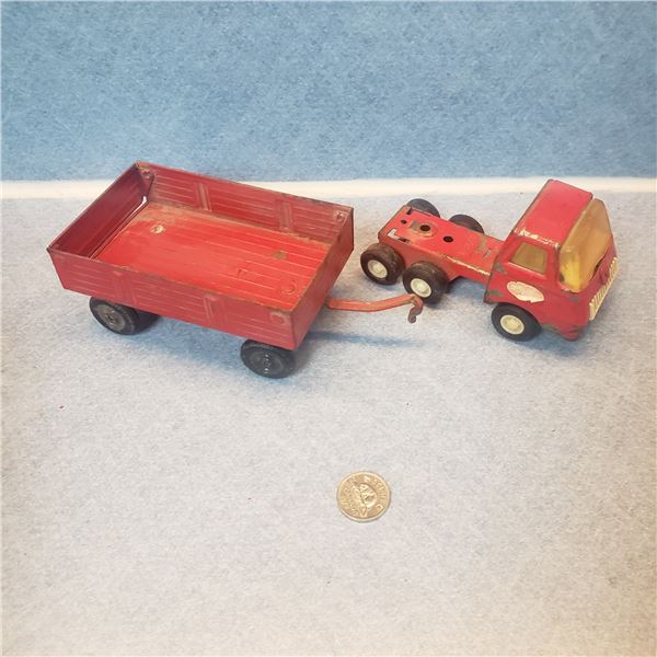 Vintage Tonka and Ertl pieces truck trailer