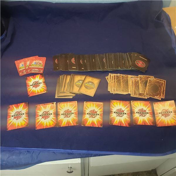 Assorted gaming card lot Bakugan,  World of Warcraft (WOW), Chaotic