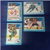 Image 1 : four Serial numbered insert hockey cards