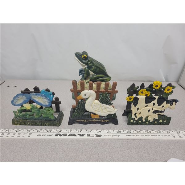 cast iron frog door stop & 3 cast iron napkin  holders
