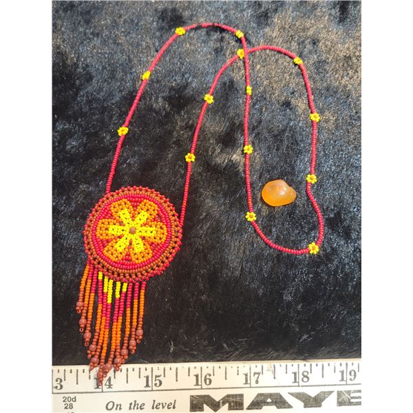 Double sided beading secret pocket necklace with a Carnelian stone