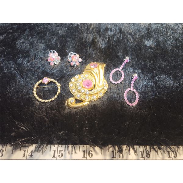 Pink rhinestone earrings and brooches