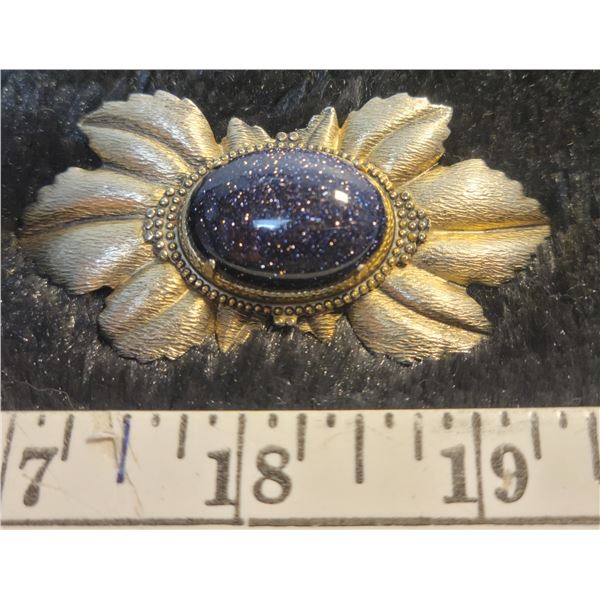 Blue Goldstone cabochon brooch
