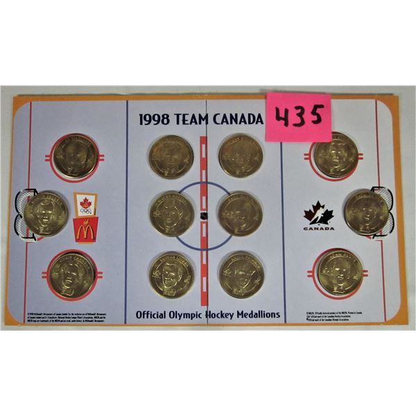 Set of 12 1998 Olympic McDonalds player coins/cardboard rink display
