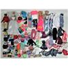Image 1 : 4 Barbie dolls and assorted genuine Barbie clothing and accessories