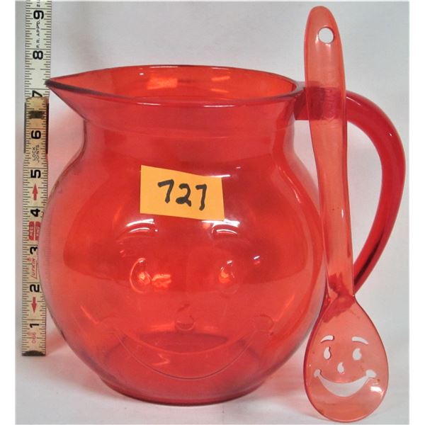 Vintage transparent plastic red smiling face Kool-Aid jug with stir spoon