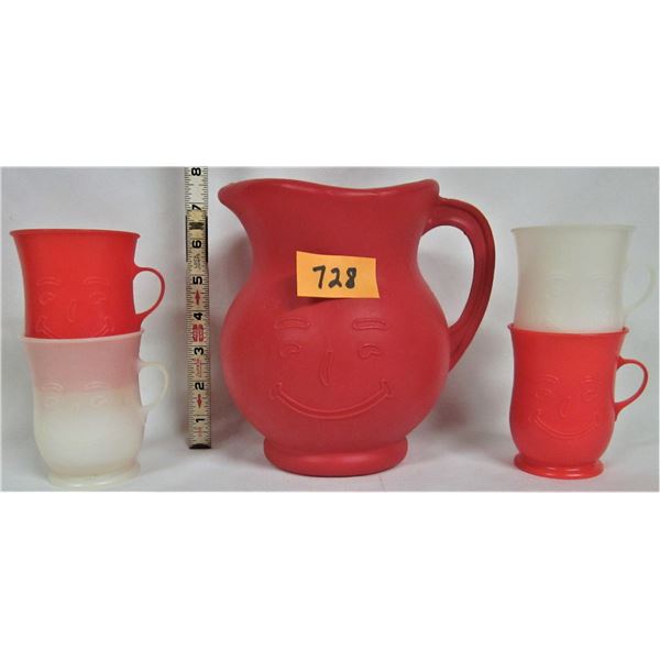Vintage plastic red smiley face Kool Aid pitcher with 4 matching cups (2 red, 2 white)