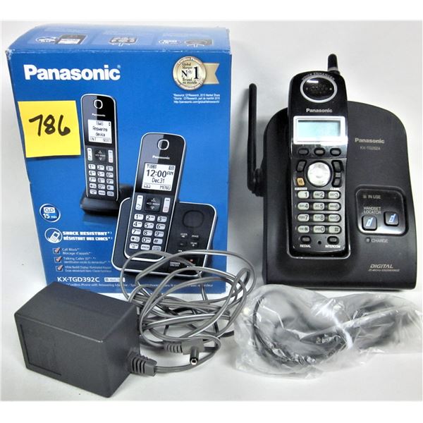 Boxed portable Panasonic cordless phone/charging station and cards