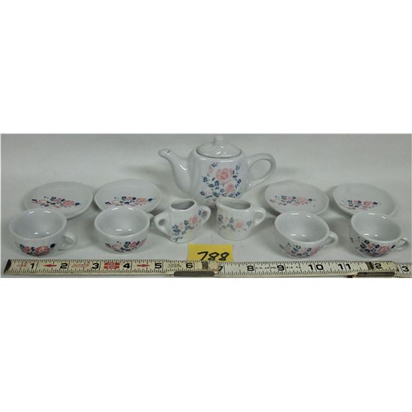 12 piece set miniature porcelain tea set 4 cups and saucers, teapot with lid and cream and sugar