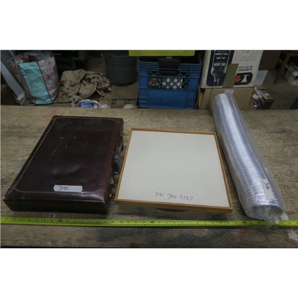 Briefcase, Dryer Ducting, and Lazy Susan