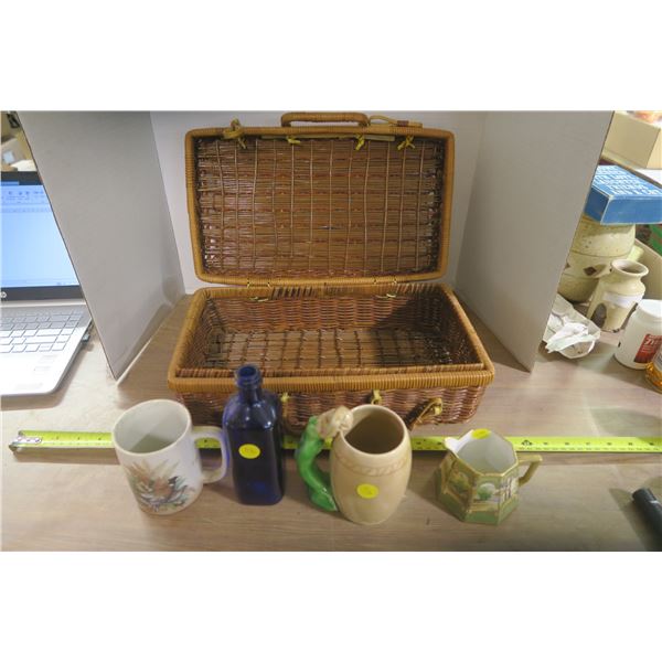 Wicker Basket & Mugs, and Blue Glass Bottle