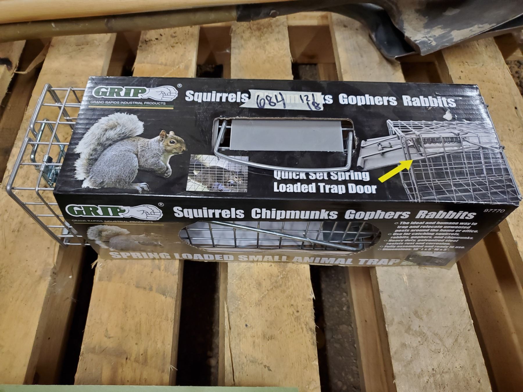SPRING LOADED SMALL ANIMAL TRAP