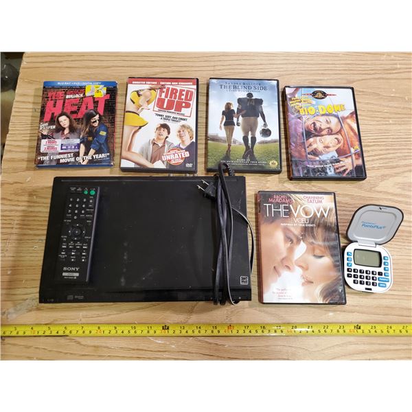 DVD PLAYER (POWERS ON, BUT MISSING FLAP) + DVDS